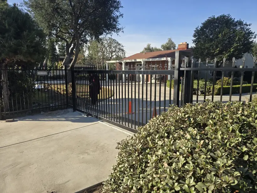 Iron driveway gate by Apexguard Fence