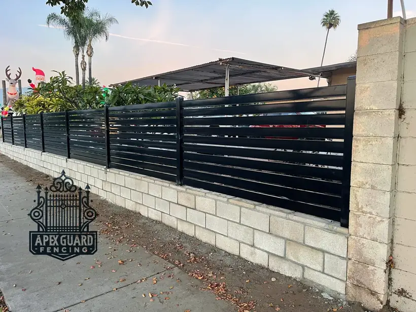 Horizontal-slat semi-privacy iron fence by Apexguard Fence